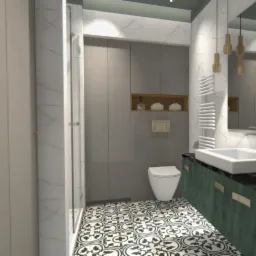 Wizualizacja łazienki z szarymi szafkami, toaletą, umywalką na zielonym blacie i wzorzystą podłogą, oświetlona wiszącymi lampami.