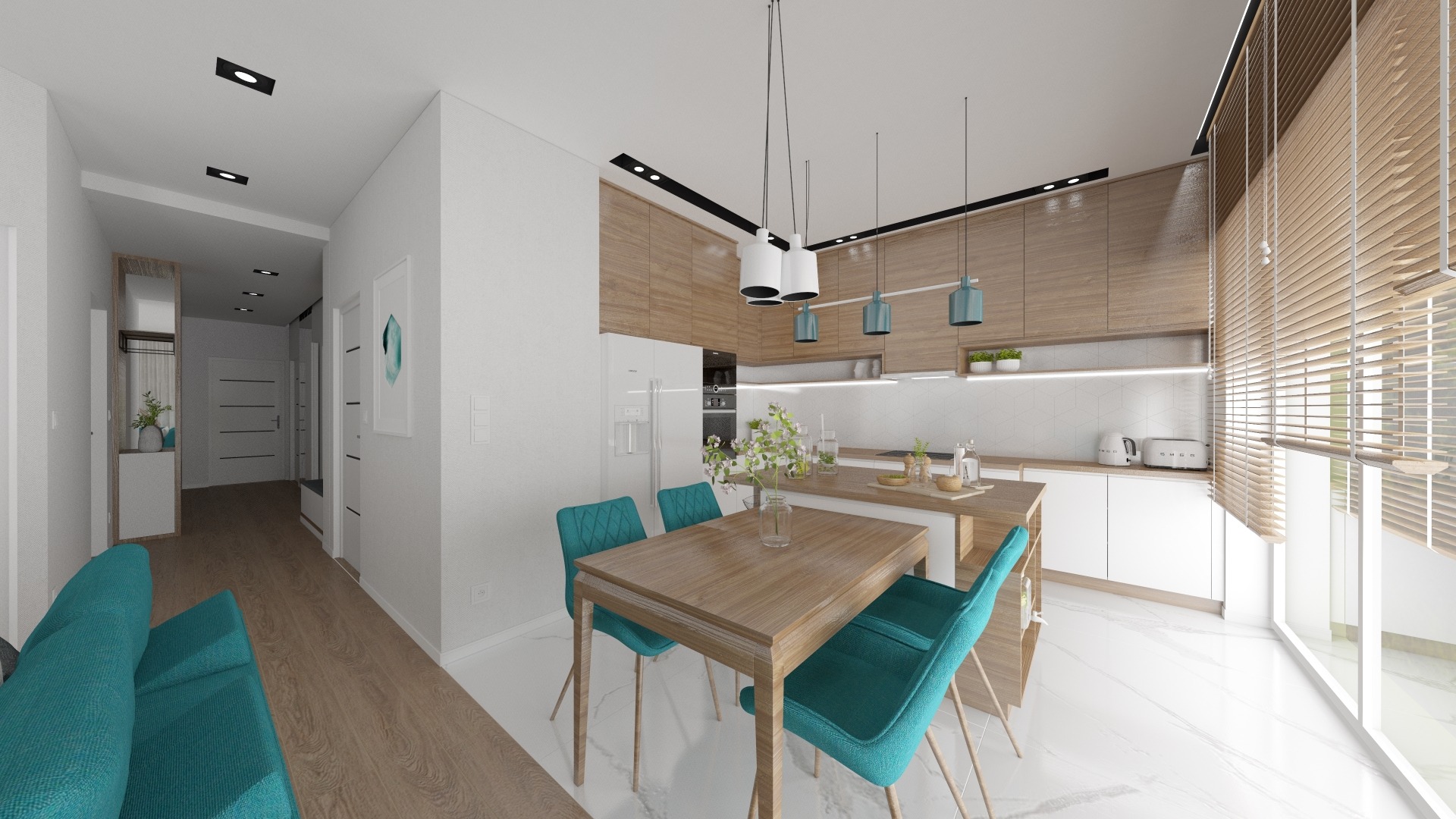 Wnętrze mieszkania z otwartą kuchnią, drewnianymi szafkami, białymi frontami, turkusowymi krzesłami i drewnianym stołem, widok na przedpokój z turkusową sofą.