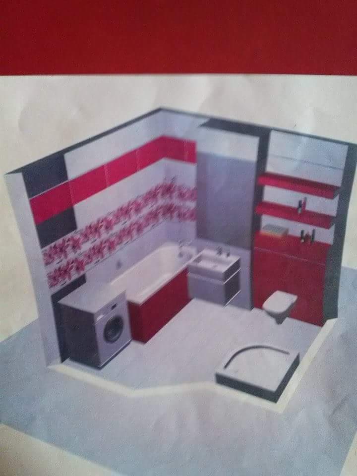 Szkic koncepcyjny łazienki z wanną, kabiną prysznicową, umywalką, toaletą i pralką, przedstawiony w perspektywie z góry, z widocznymi elementami wykończenia ścian w kolorze czerwonym i szarym.