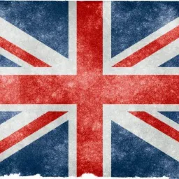 Flaga Wielkiej Brytanii z efektem postarzenia, widoczne przetarcia i nierówności faktury.