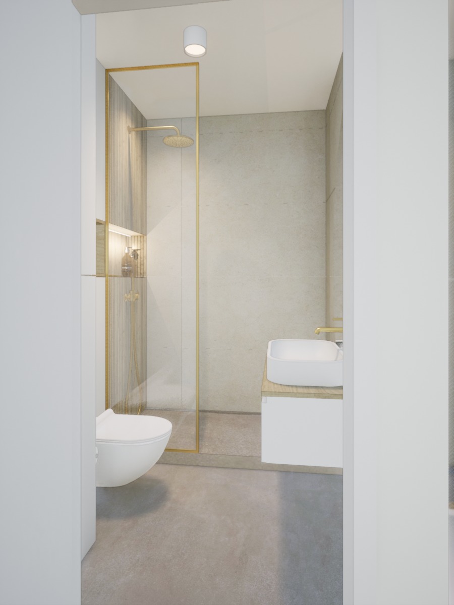 Minimalistyczna łazienka z kabiną prysznicową w złotej ramie, białą umywalką i toaletą. Stonowana kolorystyka i nowoczesny design. Widok zza rogu ściany.