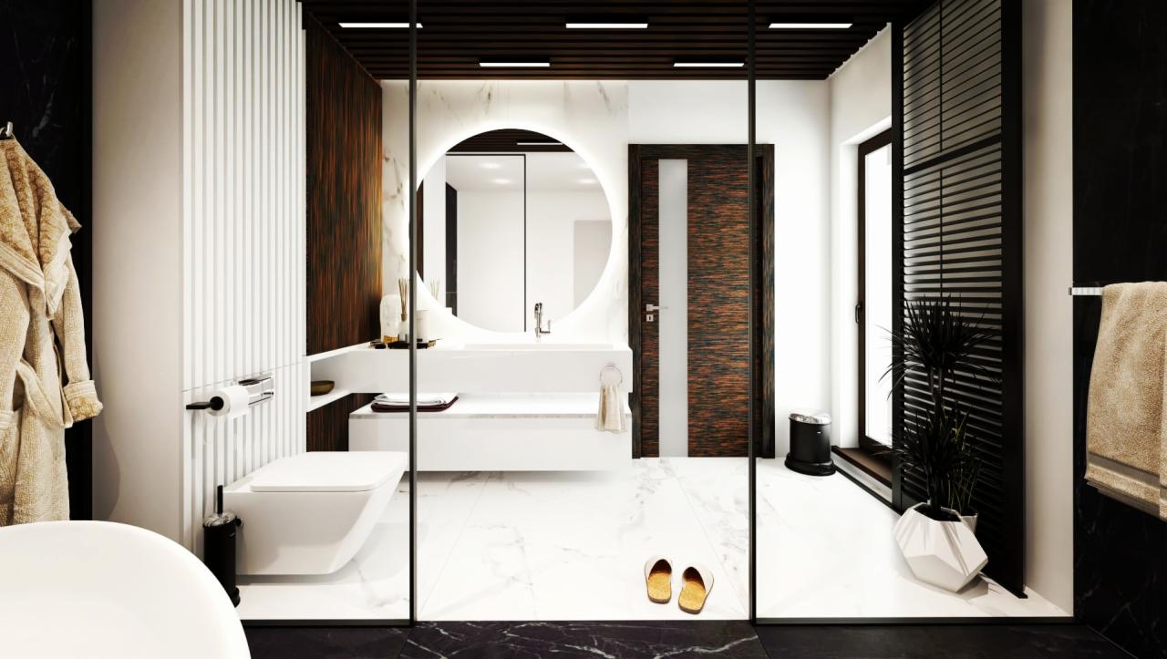 Nowoczesna łazienka z okrągłym lustrem z podświetleniem LED, białymi płytkami marmurowymi, drewnianymi akcentami i szklaną kabiną prysznicową, uzupełniona beżowym szlafrokiem i kapciami.