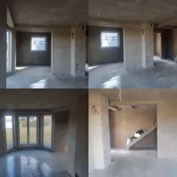 Wnętrze domu w stanie surowym po nałożeniu gładzi, widoczne ściany, posadzka i schody przed wykończeniem.