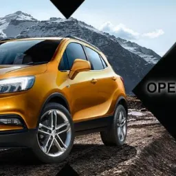 Żółty Opel Mokka na tle górskiego krajobrazu, z logo Grupa Auto Finanse w prawym górnym rogu i tekstem 'Opel w najlepszej cenie? tylko w Grupa Auto.pl' na czarnym tle.