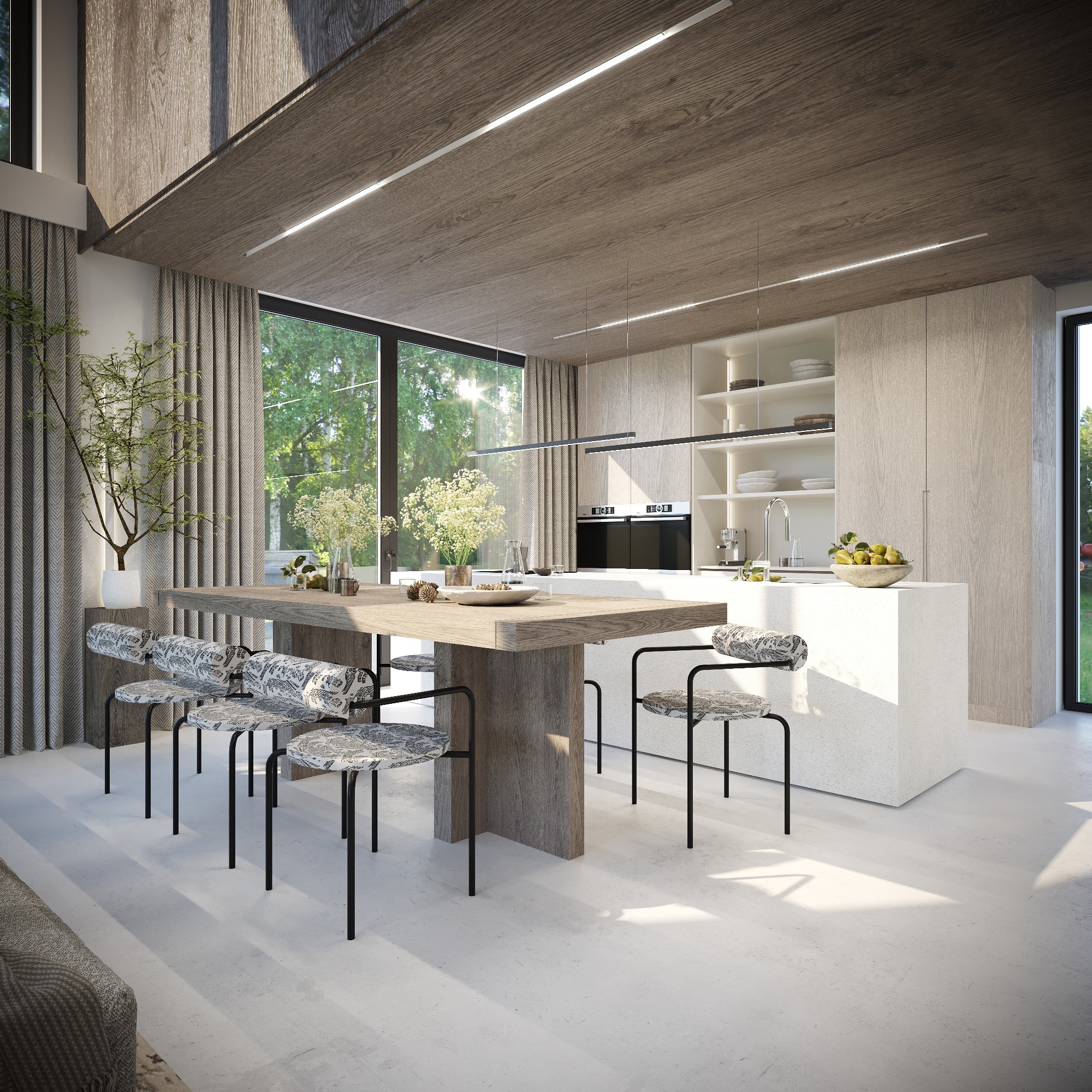 Jasna, nowoczesna jadalnia z drewnianym stołem, krzesłami z wzorzystymi siedziskami i kuchnią w tle, oświetlona naturalnym światłem z dużego okna.