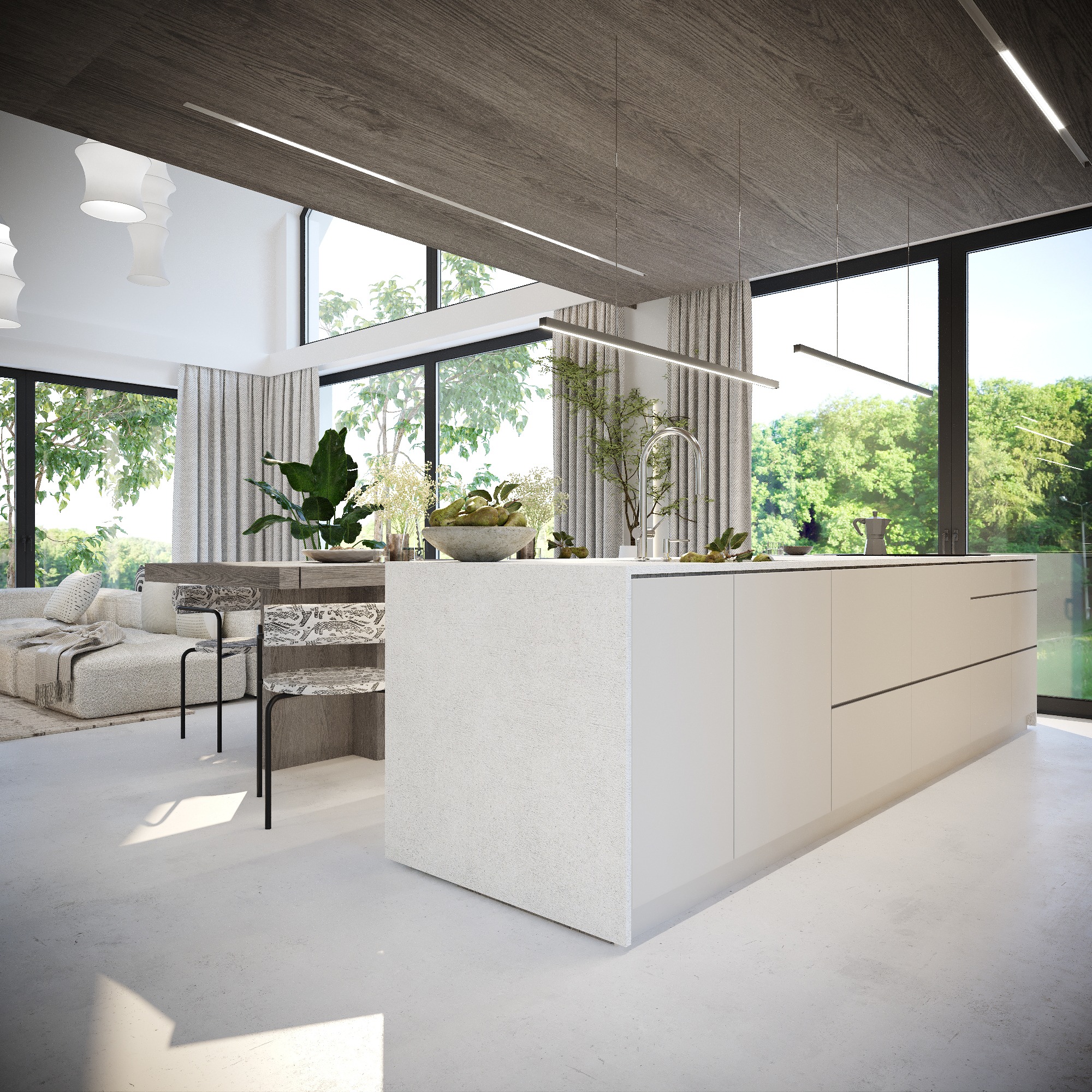 Jasna kuchnia z wyspą, minimalistyczne oświetlenie liniowe, duże okna z widokiem na zieleń, sofa w tle.