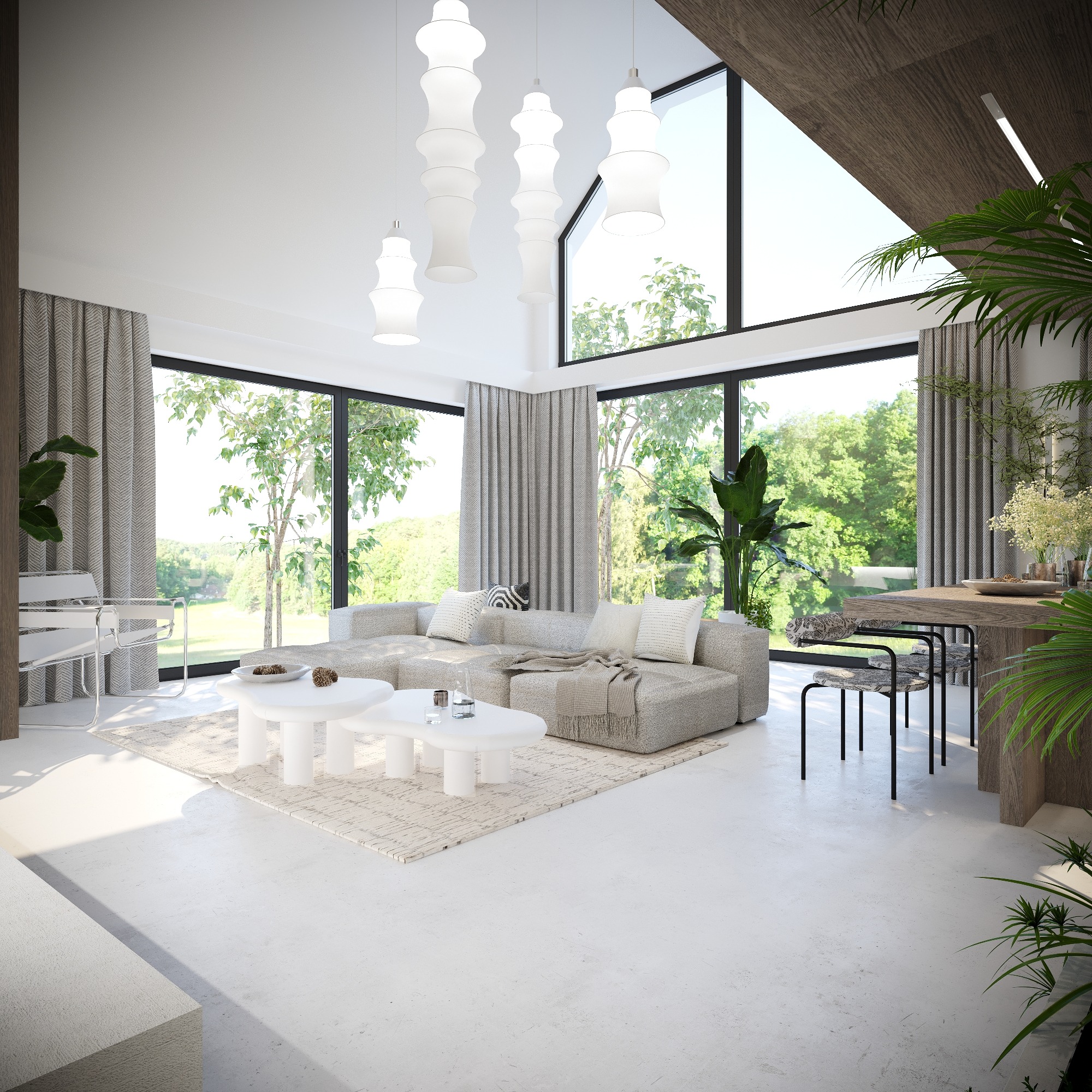 Jasne, przestronne wnętrze z dużymi oknami wychodzącymi na zieleń, szary narożnik z poduszkami i pledem, białe stoliki kawowe, designerskie lampy wiszące i rośliny doniczkowe.