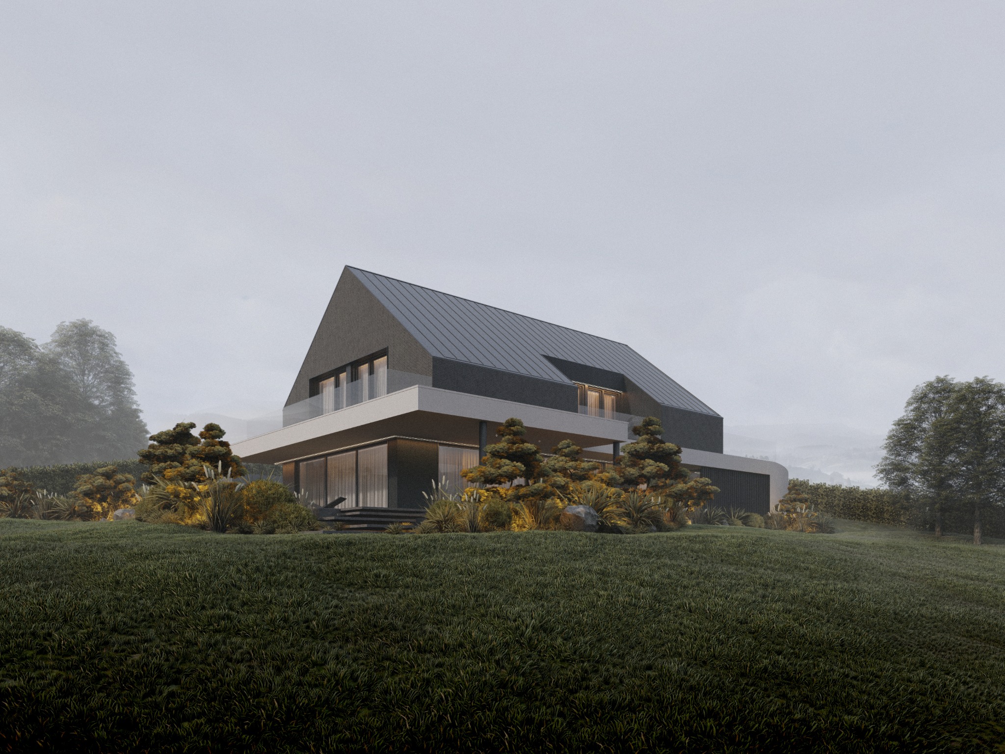Nowoczesny dom z ciemną, spadzistą bryłą dachu, otoczony zielenią i ozdobnymi krzewami, w mglisty dzień. Widok z dołu, podkreślający architekturę budynku.