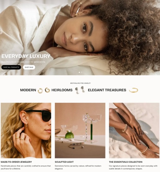 Strona internetowa sklepu jubilerskiego z modelką i ofertą biżuterii: kolczyki, pierścionki, bransoletki. Minimalistyczny design, eleganckie zdjęcia produktowe, hasło 'Everyday Luxury'.