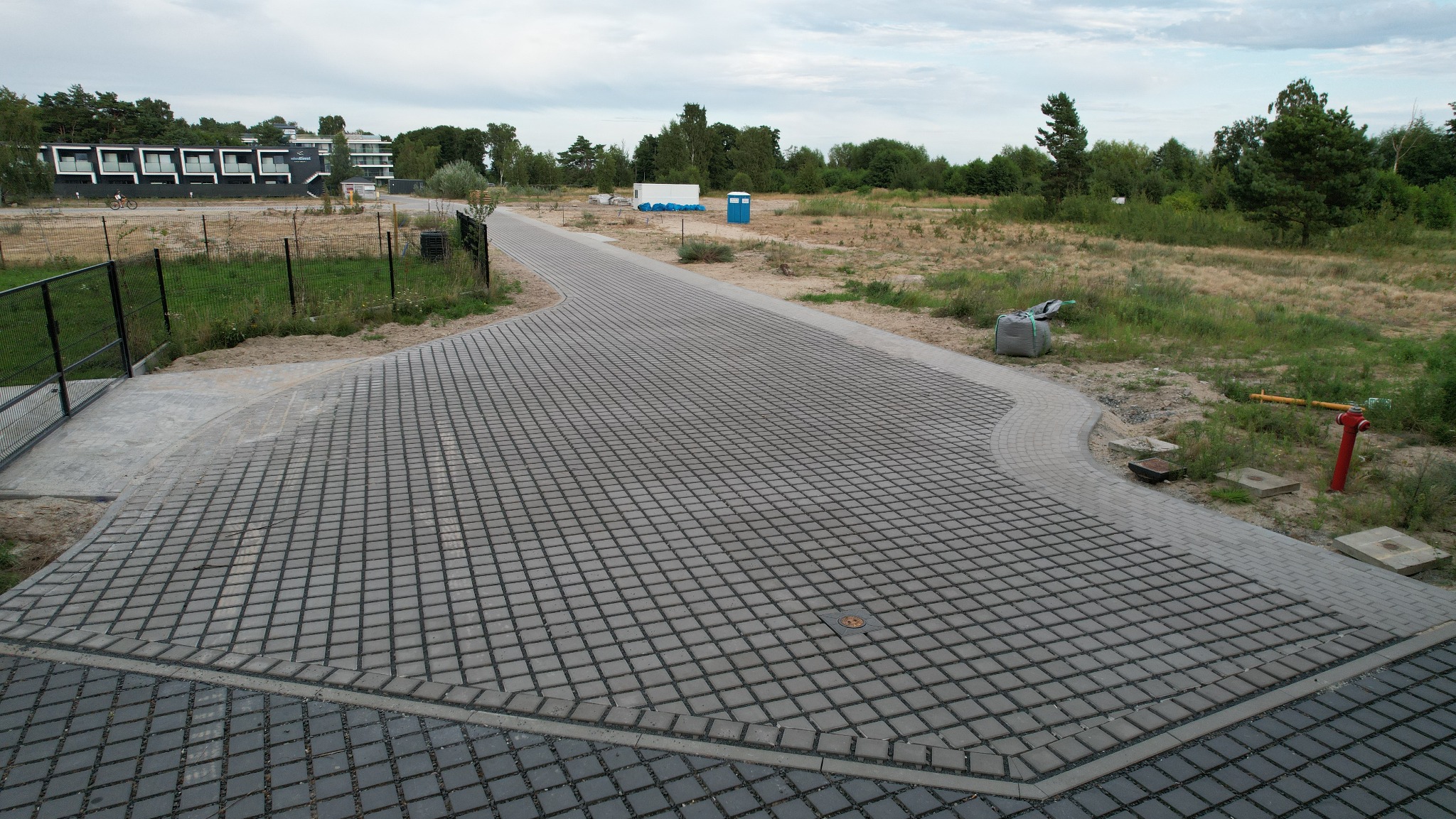 Dojazd do apartamentowców z kostki Ekol - Unieście