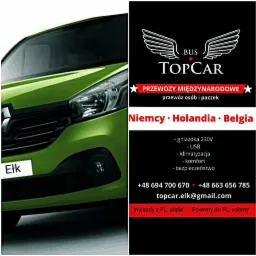 Fragment zielonego busa z widoczną tablicą rejestracyjną Ełk, obok grafika reklamowa z logo firmy TopCar, informacją o przewozach międzynarodowych do Niemiec, Holandii i Belgii oraz udogodnieniami...