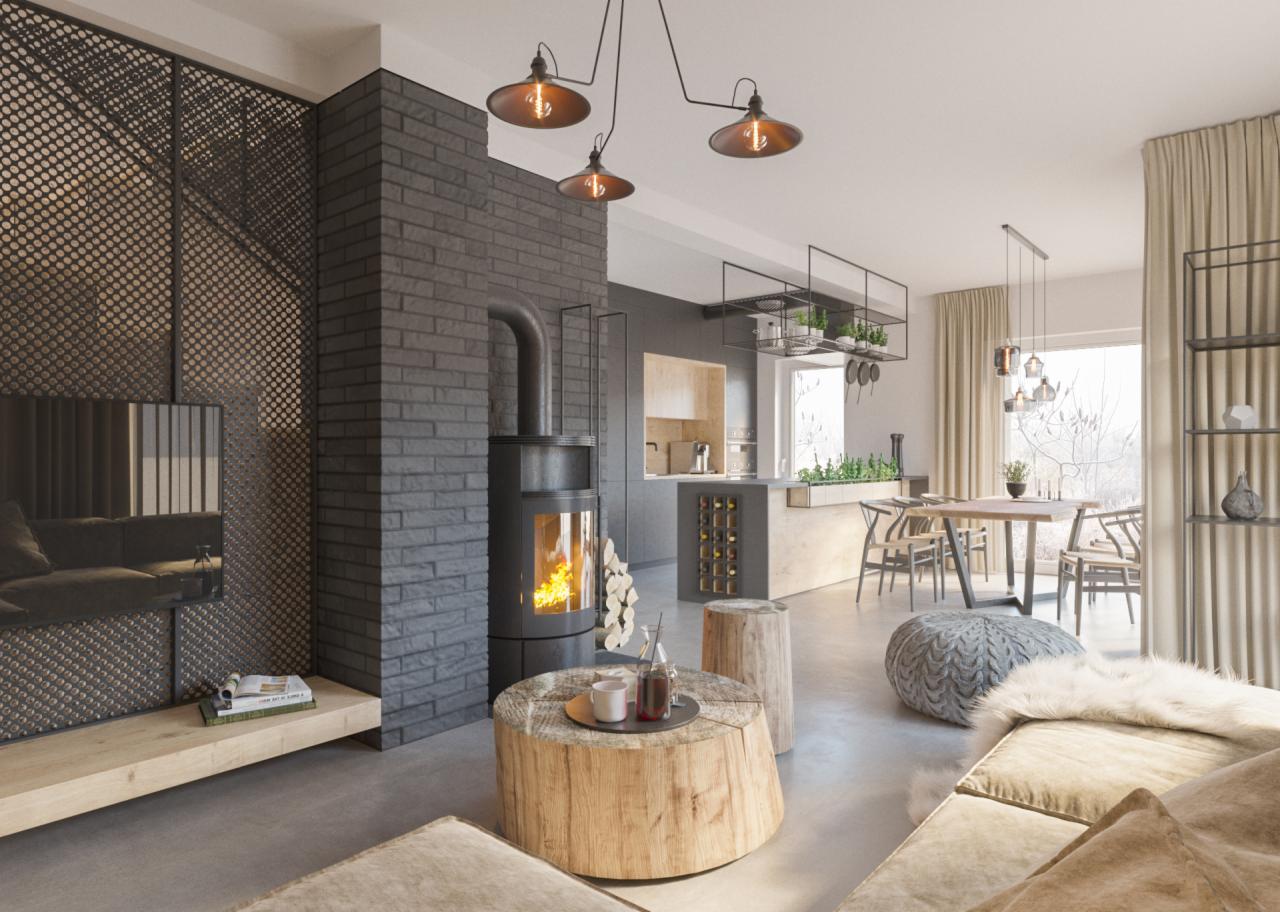 Nowoczesne wnętrze z otwartą przestrzenią: salon z kominkiem obok ściany z metalowej siatki, kuchnia z wyspą i jadalnia z widokiem na zimowy krajobraz za oknem.