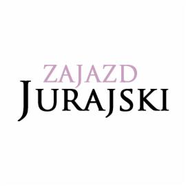 Logo Zajazdu Jurajski z nazwą w kolorze czarnym i fioletowym na białym tle.
