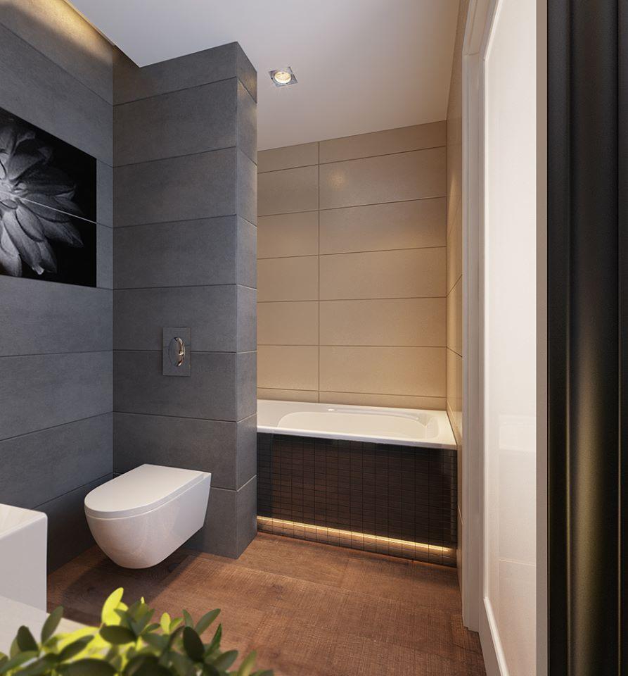 Nowoczesna łazienka z podświetlaną wanną, wiszącą toaletą i szarą ścianą z czarnym obrazem kwiatu.