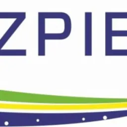 Logo firmy Ubezpieczenia PHU JAKAR w kolorystyce granatowo-zielono-żółtej, stylizowane na kosmiczną orbitę z gwiazdami.