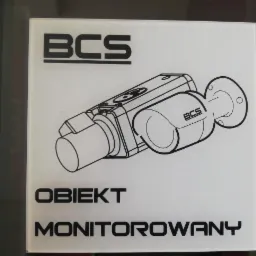 Grafika prezentująca schemat kamery monitoringu BCS z napisem 'Obiekt Monitorowany'