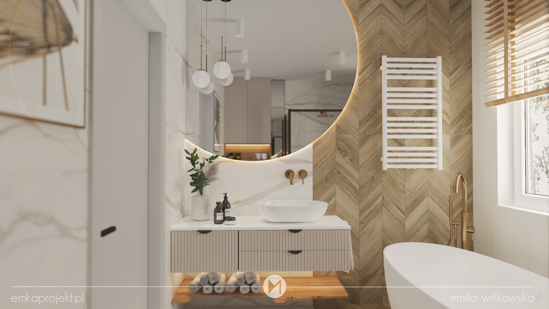 Nowoczesna łazienka z okrągłym podświetlanym lustrem, umywalką nablatową, drewnianą ścianą w jodełkę i białą wanną wolnostojącą. Na półce pod umywalką zwinięte ręczniki.