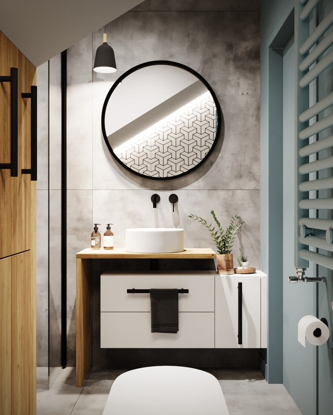 Nowoczesna łazienka z okrągłym lustrem z podświetleniem geometrycznym, białą umywalką nablatową, drewnianym blatem i szafką z czarnymi uchwytami oraz grzejnikiem drabinkowym w kolorze niebieskim.