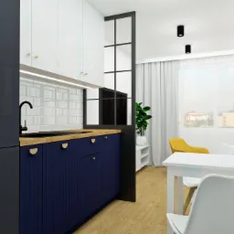 Wizualizacja wnętrza: granatowe szafki kuchenne z drewnianym blatem, białe płytki na ścianie, czarna armatura, przeszklona ścianka działowa, stół z krzesłami i żółty fotel w tle.
