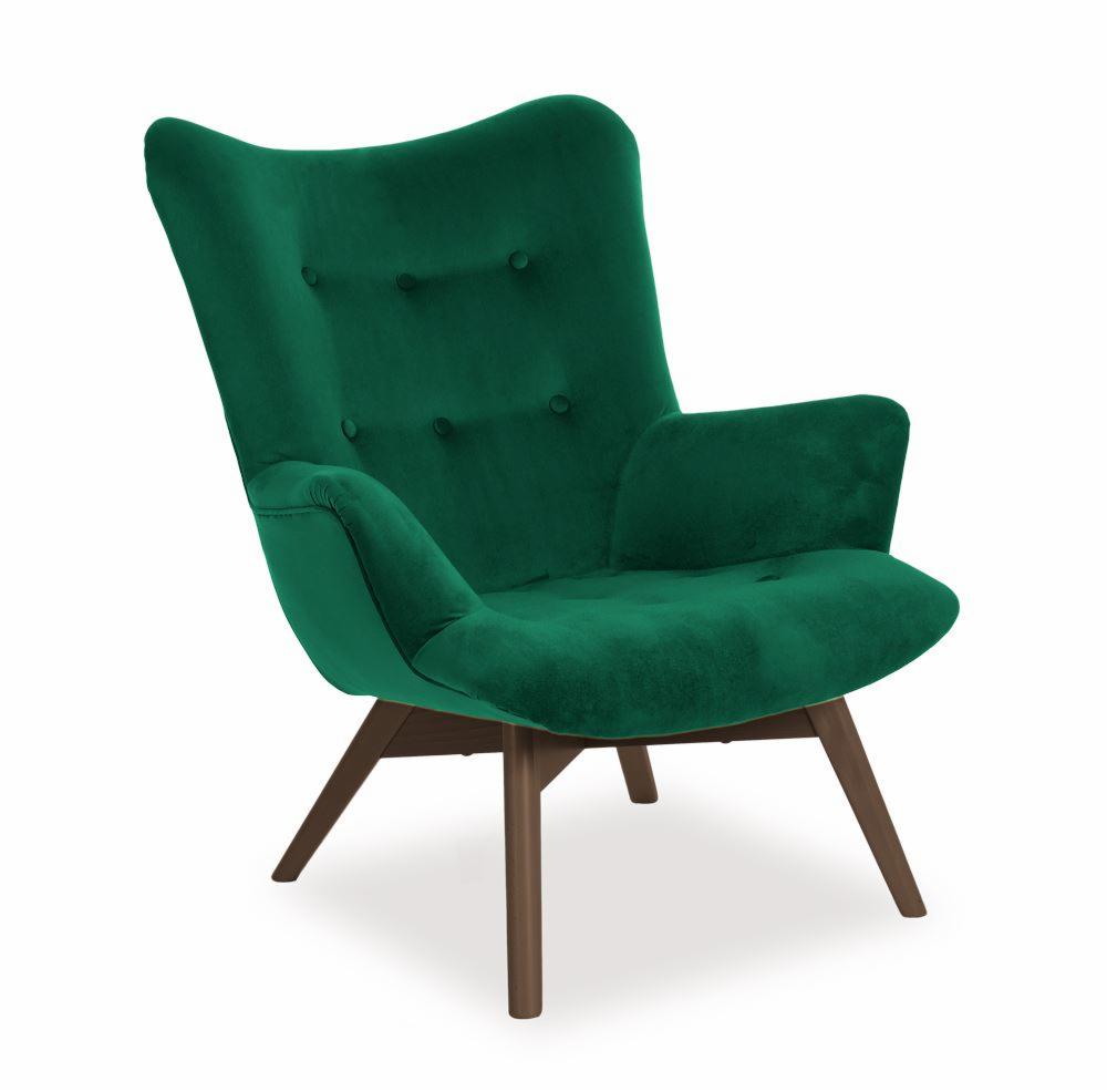 Szmaragdowy fotel uszak z welurową tapicerką i drewnianymi nogami w stylu retro, na białym tle.