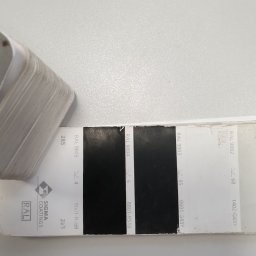 Marfab-Bud Monika Noga - Paleta kolorów farb Sigma Coatings RAL z odcieniami czerni, ułożona na białym tle.