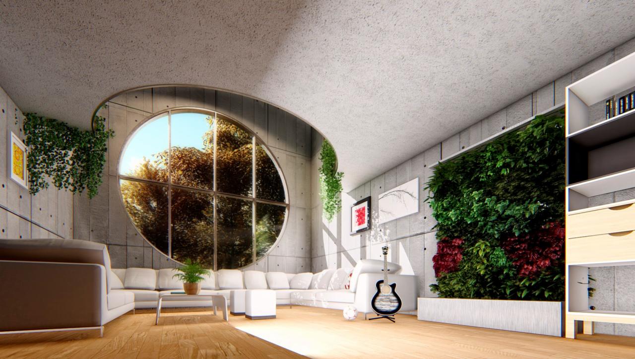 Nowoczesny salon z betonowymi ścianami, okrągłym oknem z widokiem na drzewa, zieloną ścianą z roślin i białymi meblami.