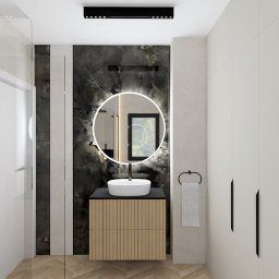 KartA Pracownia Projektowa Katarzyna Cimochowska - Nowoczesna łazienka z kabiną prysznicową, umywalką nablatową na szafce z lamelami, okrągłym lustrem podświetlanym LED i marmurową ścianą akcentową.