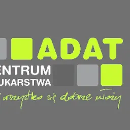 Logo firmy Centrum Brukarstwa ADAT z hasłem '...i wszystko się dobrze ułoży' na szarym tle.