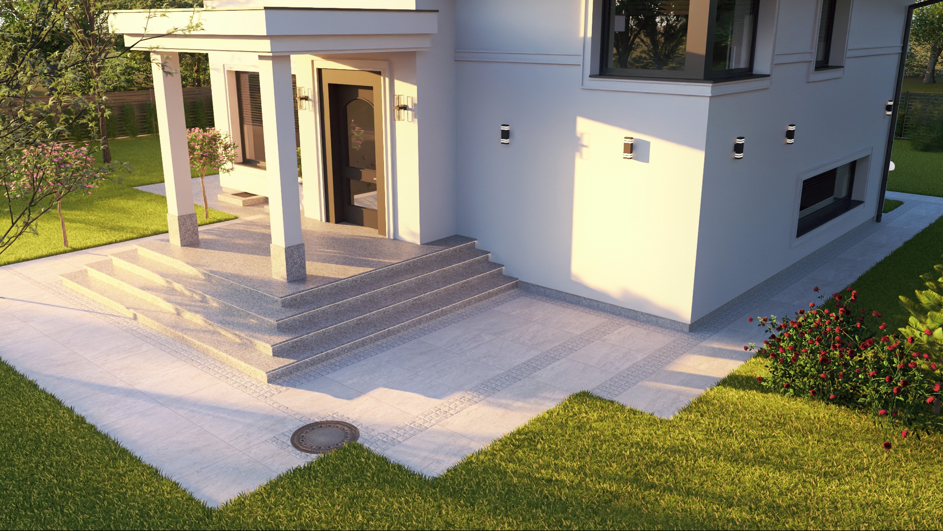 Nowoczesny dom z jasną elewacją, schodami z szarego granitu i wyłożonym płytami tarasem. Oświetlenie zewnętrzne podkreśla architekturę budynku.