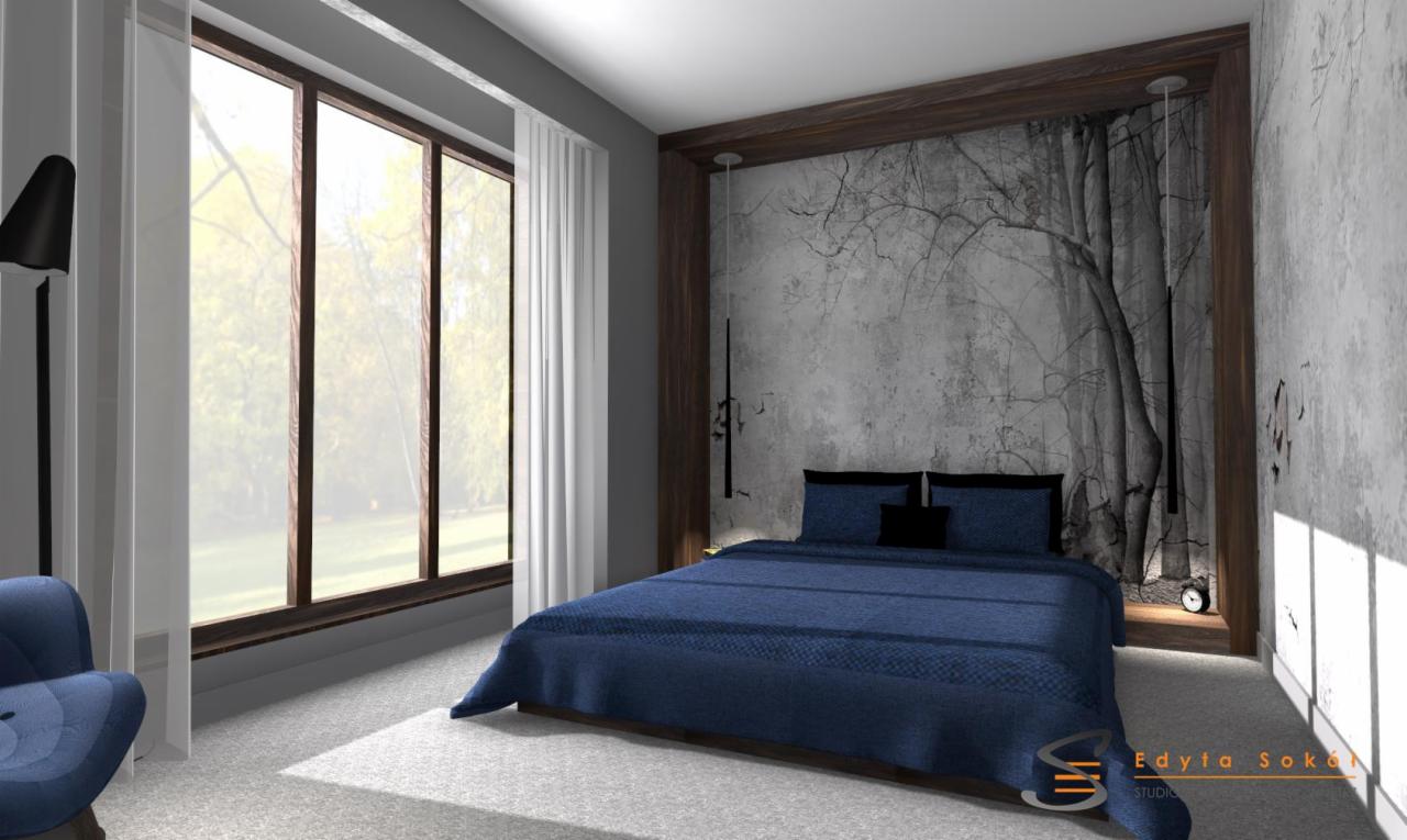 Wizualizacja sypialni z łóżkiem w odcieniach granatu, dużą oknem i fototapetą imitującą drzewo na betonowej ścianie.