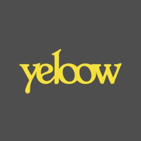 Żółty napis 'yeloww' na szarym tle, wykonany ozdobną, niestandardową czcionką.