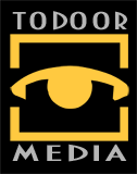 Logo firmy TODOR MEDIA w kolorach czarnym, szarym i złotym, przedstawiające stylizowane oko w kwadratowej ramce.