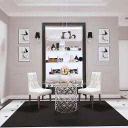 Elegancka jadalnia w odcieniach szarości i bieli z okrągłym stołem ze szklanym blatem i ażurową podstawą, otoczonym przez dwa krzesła w stylu glamour oraz z wbudowaną w ścianę przeszkloną witryną.
