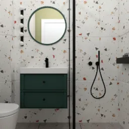 Wizualizacja łazienki z umywalką na szafce w kolorze butelkowej zieleni, okrągłym lustrem z zieloną ramą i baterią w kolorze czarnym. Na ścianach płytki w stylu terrazzo, a obok umywalki panel...