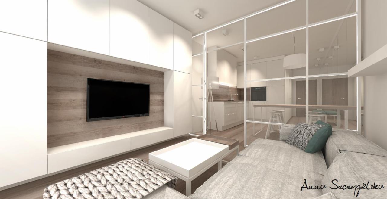Wizualizacja nowoczesnego salonu z przeszkloną ścianą oddzielającą kuchnię, białe meble na wymiar, drewniane panele ścienne za telewizorem, szara sofa z dekoracyjnymi poduszkami.