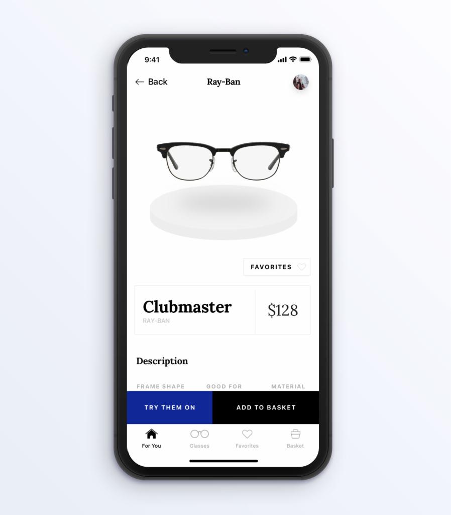 Ekran smartfona prezentujący aplikację Ray-Ban z wirtualnym modelem okularów Clubmaster na białym tle, cena 128 dolarów, opcje 'Try them on' i 'Add to basket' widoczne na dole.