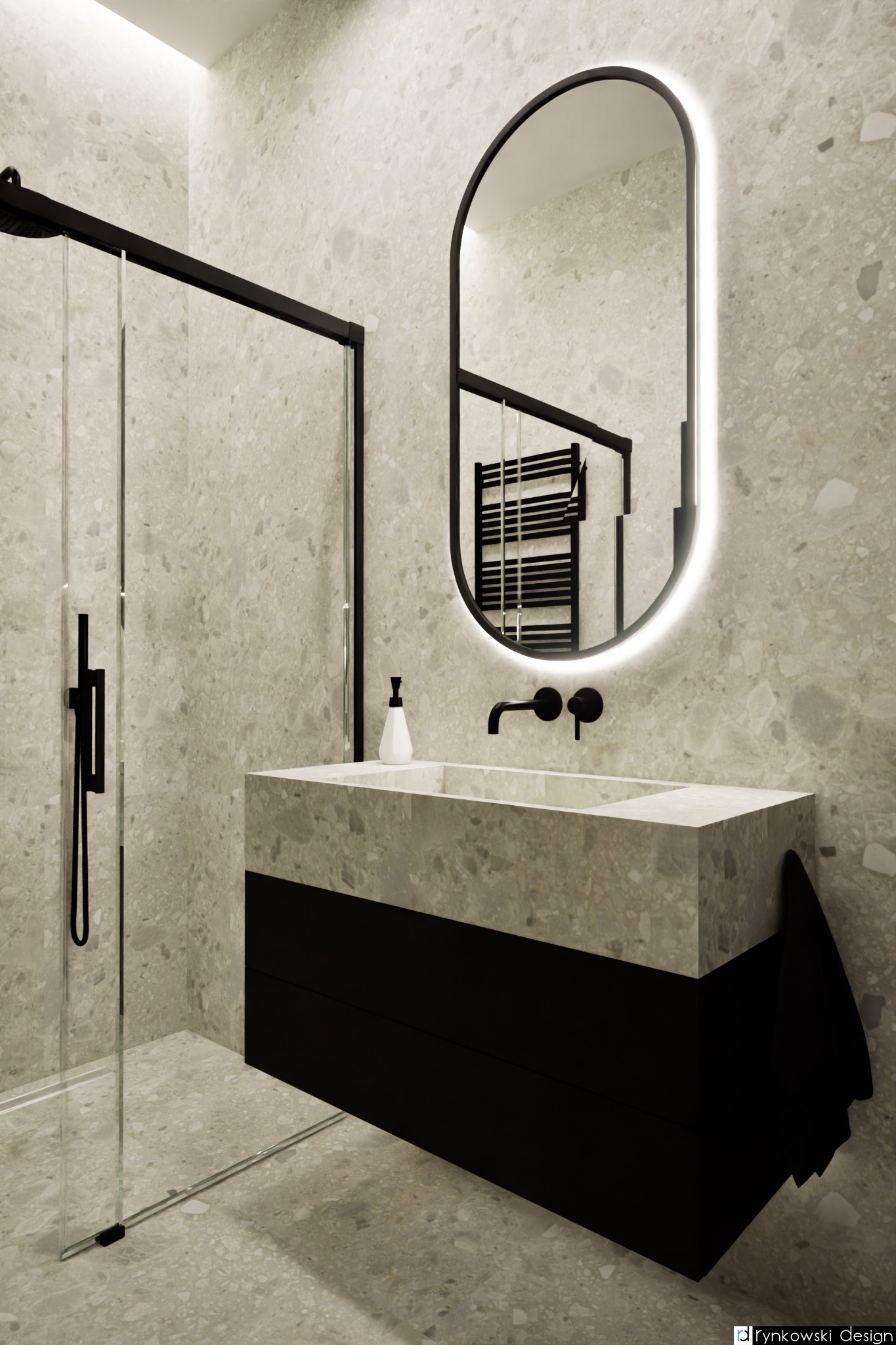 Nowoczesna łazienka z prysznicem typu walk-in, umywalką w odcieniach szarości i czarnymi akcentami, takimi jak rama lustra z podświetleniem LED i armatura.