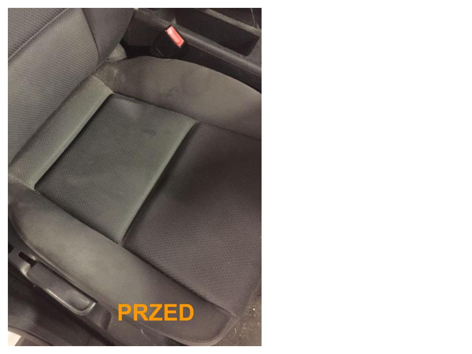 Brudny, szary fotel samochodowy z widocznymi plamami i napisem 'PRZED' w dolnej części zdjęcia.