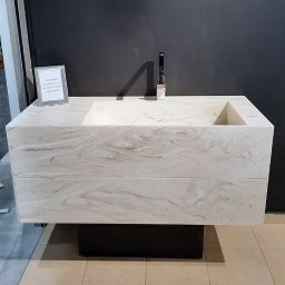 Monolityczna szafka łazienkowa z umywalką liniową, konglomerat mineralny Corian Dune Prima