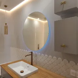 Nowoczesna łazienka z okrągłym lustrem podświetlanym LED, umywalką nablatową z brązową armaturą, drewnianym blatem i szafkami z dekoracyjnymi uchwytami w kształcie ważek.