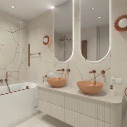 Modei Sztuka & Design - Elegancka łazienka z dwoma umywalkami w odcieniach brzoskwini, podświetlanymi lustrami i płytkami imitującymi marmur z żyłami w kolorze miedzi. Nowoczesny design.