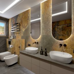 Modei Sztuka & Design - Nowoczesna łazienka z kamiennymi płytkami, owalnymi lustrami z podświetleniem LED i białymi umywalkami nablatowymi. Minimalistyczna armatura w kolorze czarnym.