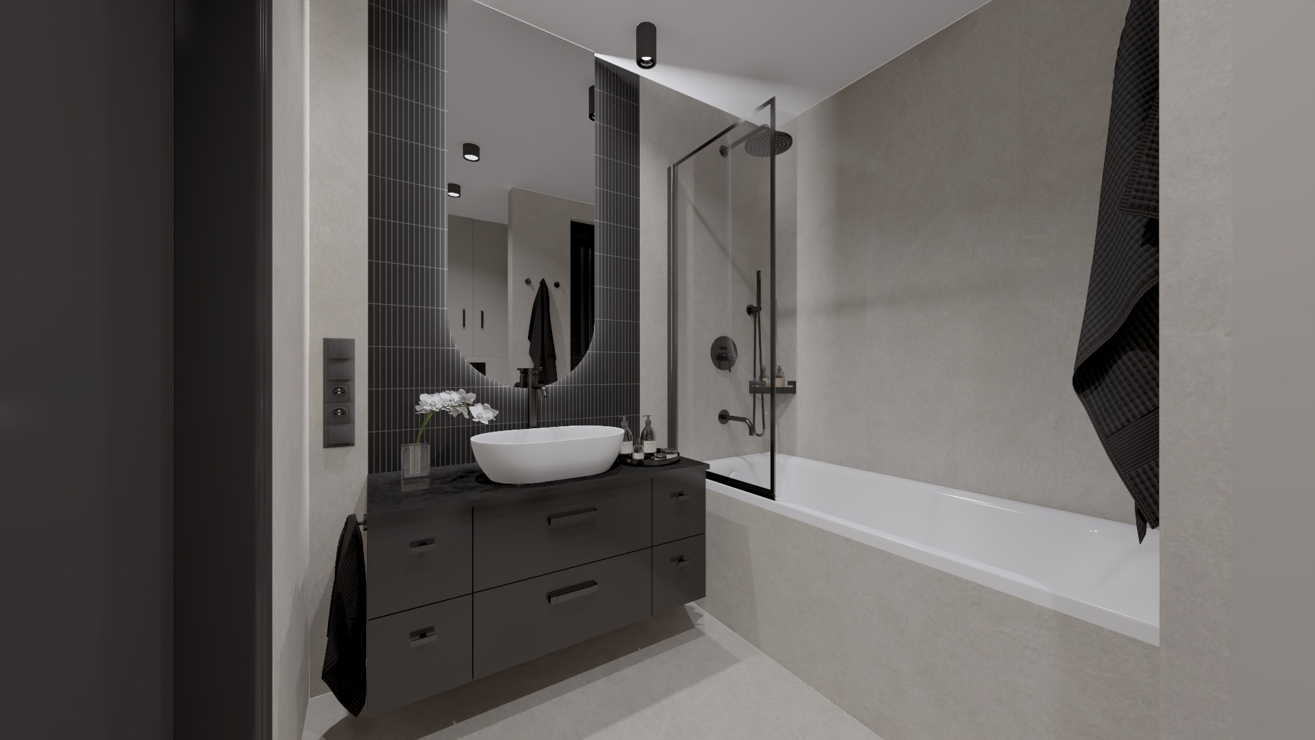 Nowoczesna łazienka z owalną umywalką nablatową, czarną szafką pod umywalką, okrągłym lustrem, kabiną prysznicową i wanną.