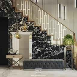 Arch-Boom - Eleganckie wnętrze z marmurową ścianą i schodami, oświetlone wiszącymi lampami i kinkietami, z ławką tapicerowaną i dekoracyjnym stolikiem przy lustrze.