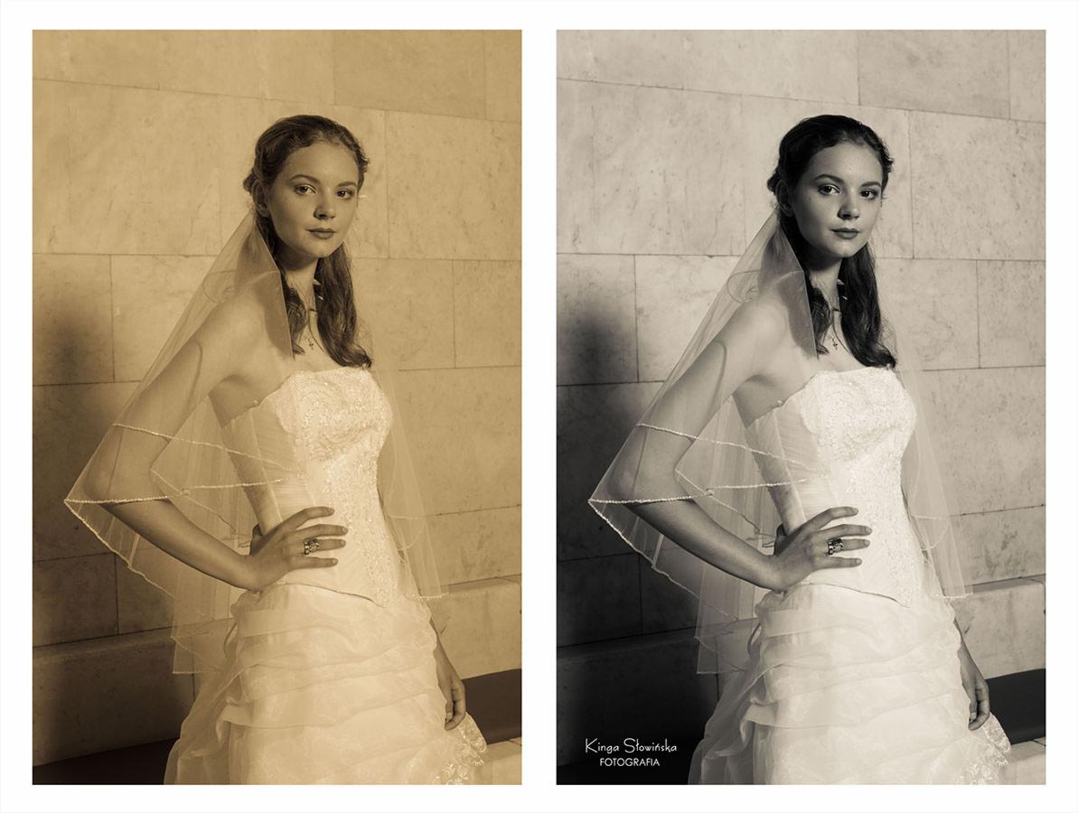 Portret panny młodej w sukni bez ramiączek i welonie, w sepii i czerni i bieli, pozującej na tle ściany z kamiennych bloków.
