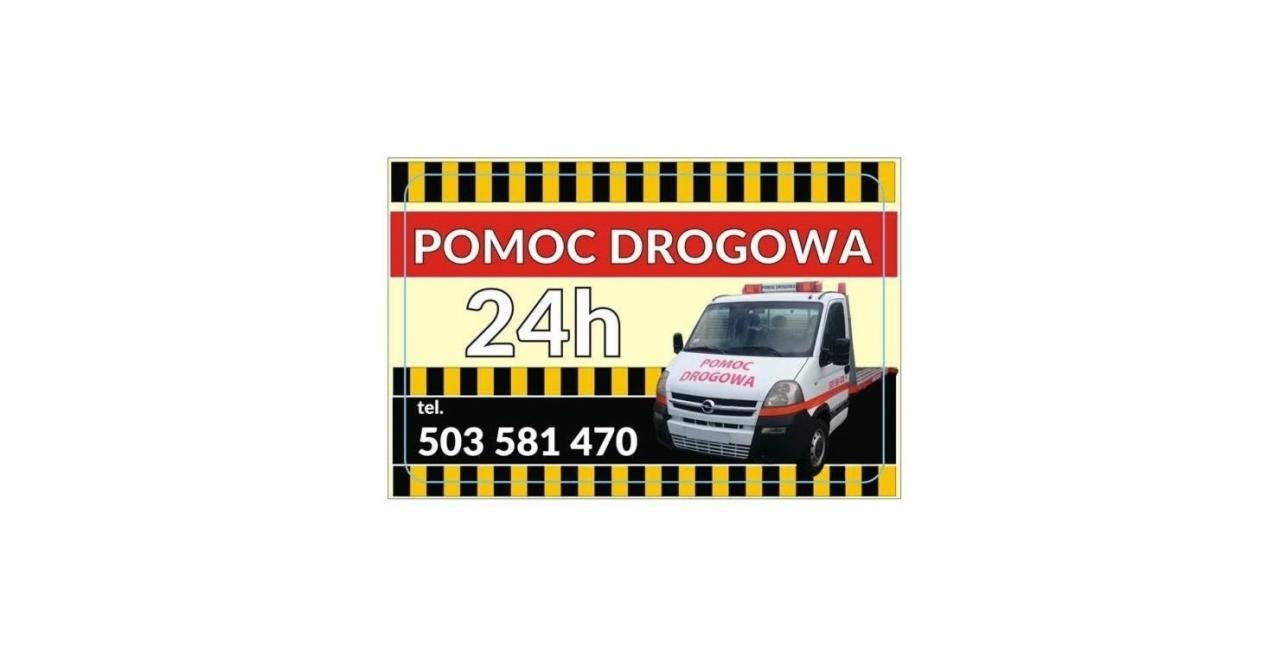 Grafika reklamowa z białym busem pomocy drogowej i numerem telefonu, informująca o dostępności 24h.