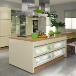 Jasna, nowoczesna kuchnia z wyspą i frontami szafek z mlecznego szkła, stalowym okapem i blatem z drewna, uzupełniona zielonymi akcentami dekoracyjnymi.