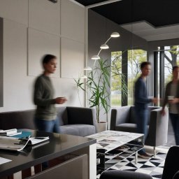 Aranżacja, projektowanie wnętrz MIA PROJEKT Maria Leśna - Nowoczesne biuro z przeszkloną ścianą, minimalistycznym oświetleniem i elementami dekoracyjnymi. Wnętrze wypełnione naturalnym światłem, z widocznymi osobami w ruchu.
