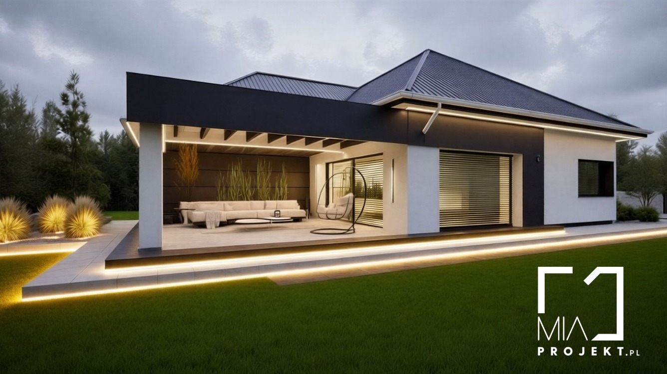 Nowoczesny dom z oświetlonym tarasem i minimalistycznym designem. Widoczne meble ogrodowe, trawa i dekoracyjne oświetlenie.