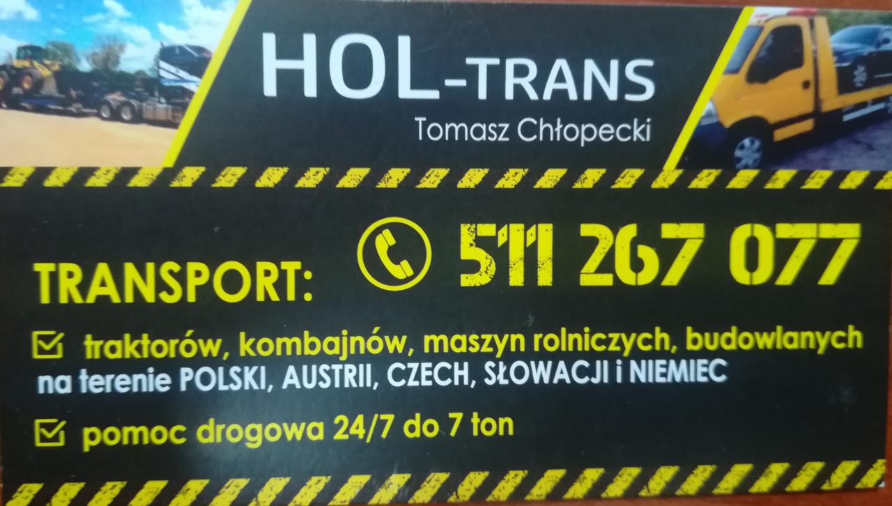Wizytówka firmy HOL-TRANS oferującej transport traktorów, kombajnów, maszyn rolniczych i budowlanych na terenie Polski, Austrii, Czech, Słowacji i Niemiec, z numerem telefonu 511 267 077...